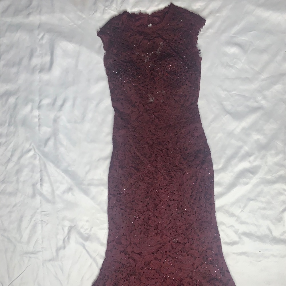 A burgundy colored prom dress. Used once only!!